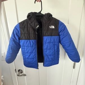 The North Face toddler reversible Blue and Black Puffer Jacket